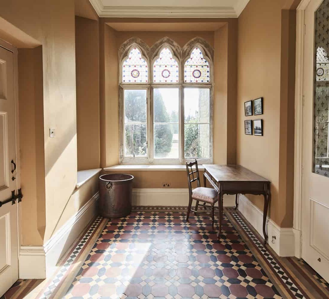 Manton Property, Grade II listed Gothic Manor. Gloucestershire countryside. Project Management. Renovation. Stone mullion windows.