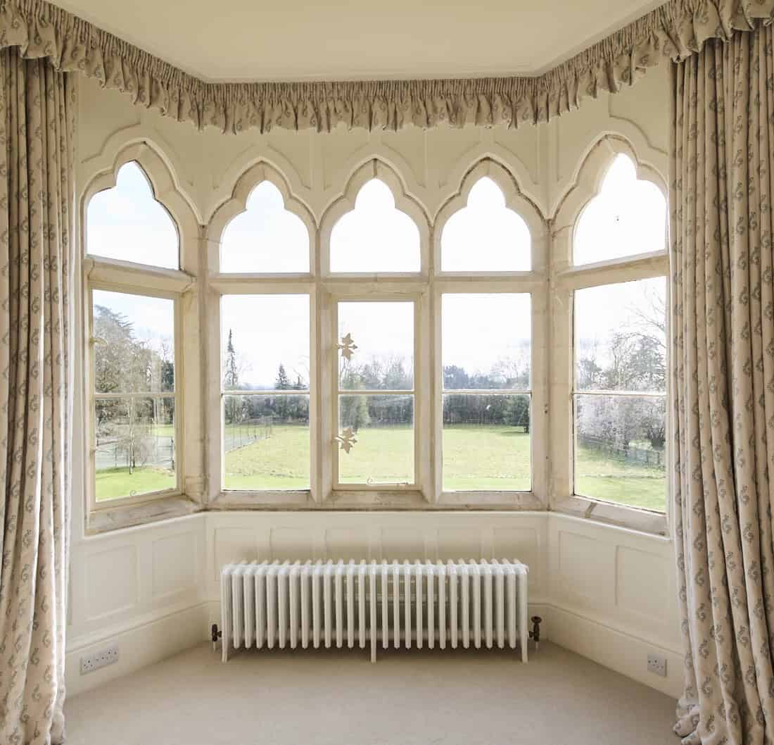 Manton Property, Grade II listed Gothic Manor. Gloucestershire countryside. Project Management. Renovation. Stone mullion windows.
