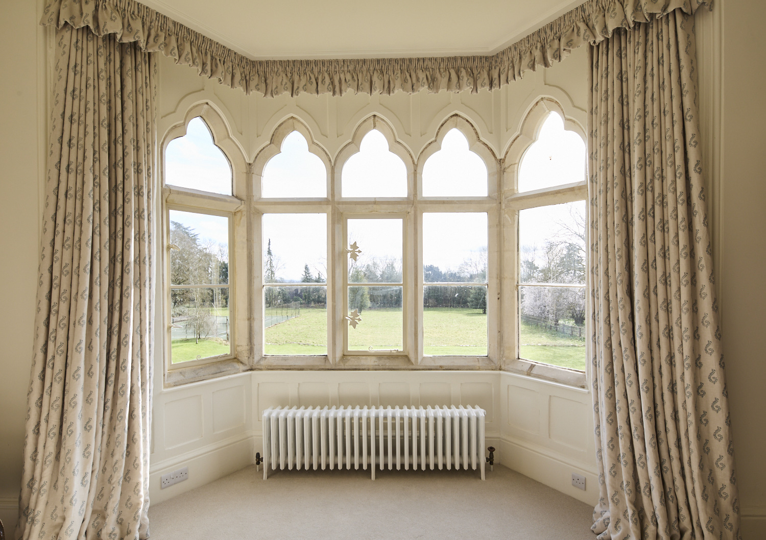 Manton Property, Grade II listed Gothic Manor. Gloucestershire countryside. Project Management. Renovation. Stone mullion windows.